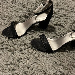 Used only once, dark blue sparkly heel.